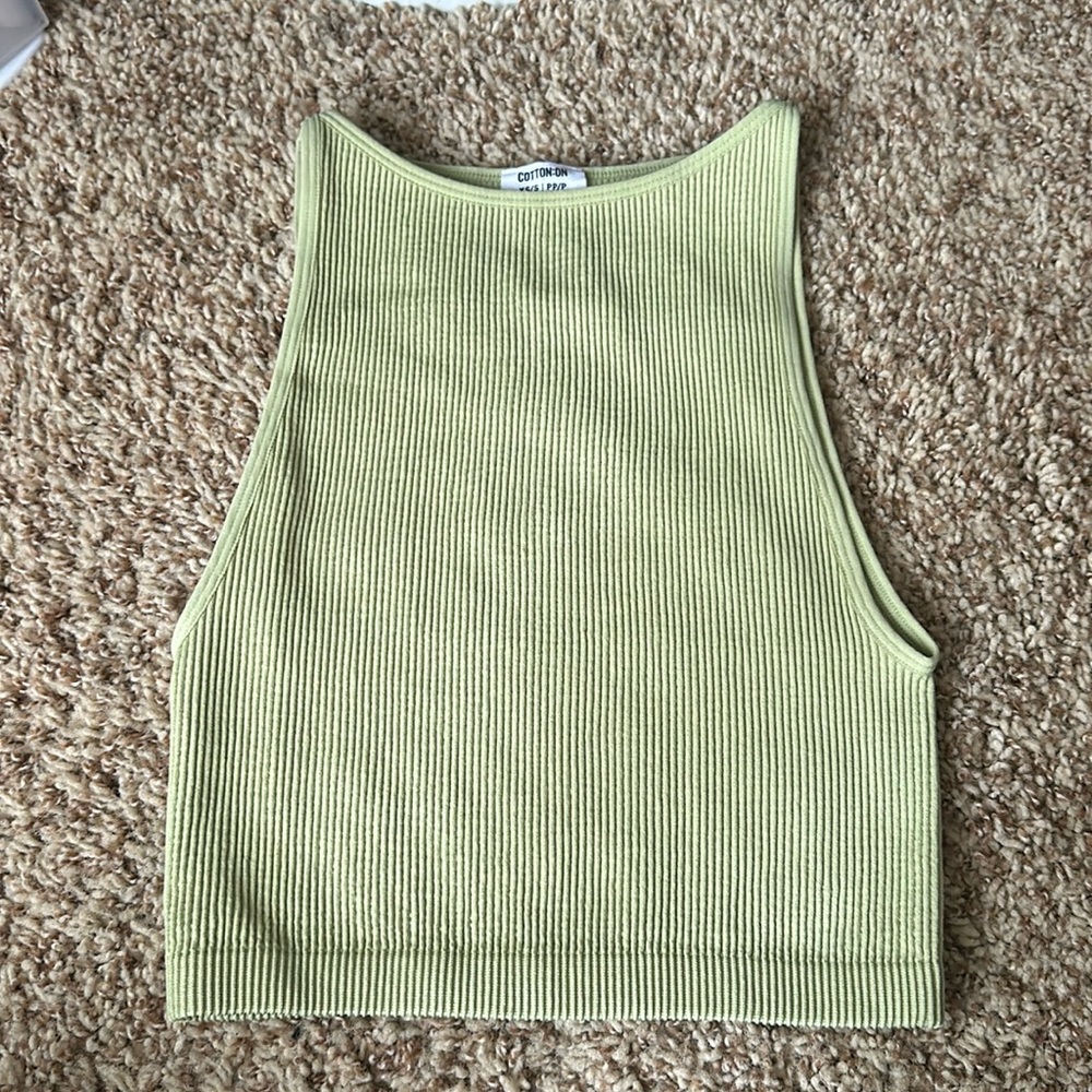 I’m selling a green seamless venni high neck tank.